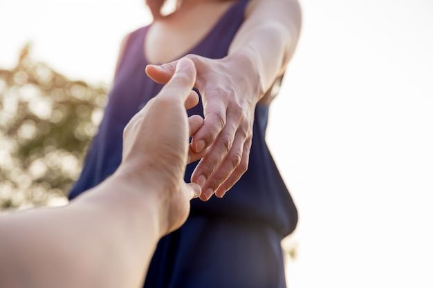 Female hands reaching out for help each other_ _ Premium Photo